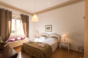 Lova arba lovos apgyvendinimo įstaigoje Flaminia - B&B Tevere Home "Bed your Breakfast"