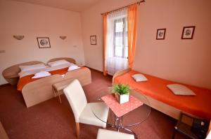 Postel nebo postele na pokoji v ubytování Hotel Paradies