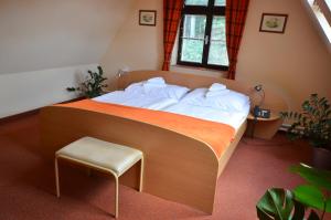 Postel nebo postele na pokoji v ubytování Hotel Paradies