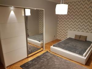 Posteľ alebo postele v izbe v ubytovaní Rzeszów Apartment