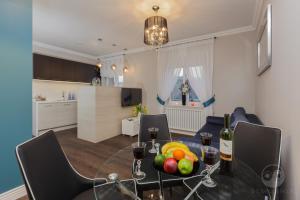 TV a/nebo společenská místnost v ubytování Apartamenty City.