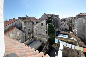 an aerial view of a city with buildings at Palace Central Square in Trogir