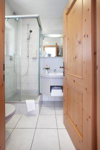 Koupelna v ubytování Hotel Hubertus