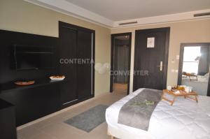 Postel nebo postele na pokoji v ubytování Tempoo Hotel Marrakech City Centre Adults Only