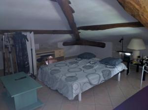Katil atau katil-katil dalam bilik di Gite de Lafargue