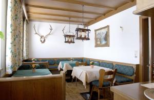 A restaurant or other place to eat at Pension Margret