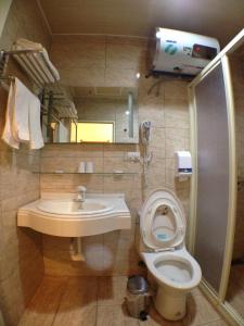 Koupelna v ubytování Long Zhi Yue Hotel + 34 fotografií