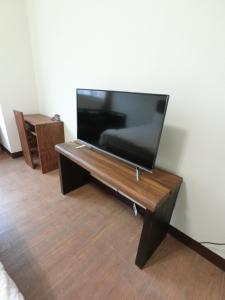 TV a/nebo společenská místnost v ubytování Long Zhi Yue Hotel