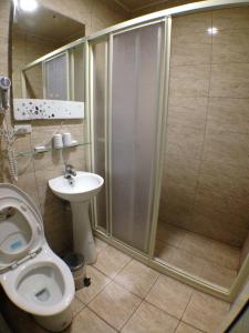 Koupelna v ubytování Long Zhi Yue Hotel