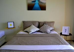 Postel nebo postele na pokoji v ubytování B&B Las Playitas