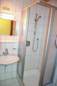 Koupelna v ubytování Tennladen Apartments