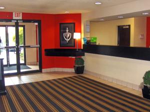 a lobby of a hospital with an exit sign on the wall at Extended Stay America Suites - Atlanta - Duluth in Duluth