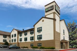 a hotel building with a sign on top of it at Extended Stay America Suites - Atlanta - Duluth in Duluth