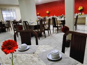 Restoran või mõni muu söögikoht majutusasutuses Hotel Comodoro