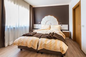 Voodi või voodid majutusasutuse Hotel Paradiso toas