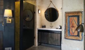 a bathroom with a sink and a mirror at SOTA Cappadocia in Urgup