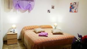 Postel nebo postele na pokoji v ubytování Rosy B&B
