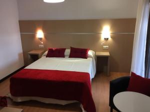 Ein Bett oder Betten in einem Zimmer der Unterkunft Casa Blanco Conde