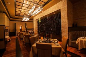 a restaurant with tables and chairs in a room at Silver Reef Casino Resort in Ferndale