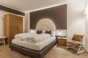 Voodi või voodid majutusasutuse Hotel Paradiso toas