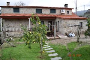 Vonkajšia záhrada v ubytovaní Casa Rural Os Carballos