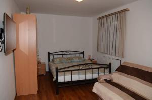 Posteľ alebo postele v izbe v ubytovaní Apartments Villa Split