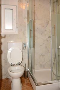 Kylpyhuone majoituspaikassa Apartments Villa Split