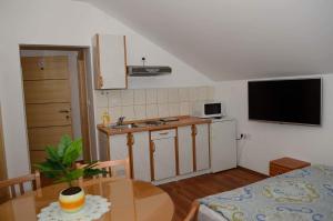 Kuchyňa alebo kuchynka v ubytovaní Apartments Villa Split