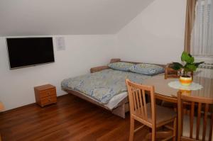 Ένα ή περισσότερα κρεβάτια σε δωμάτιο στο Apartments Villa Split
