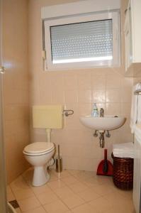 Kúpeľňa v ubytovaní Apartments Villa Split