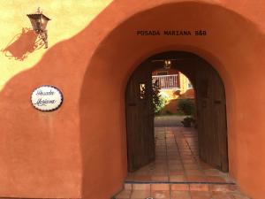 an entrance to a building with an archway at Posada Mariana Bed and Breakfast in Catheys Valley