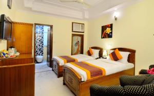 Postel nebo postele na pokoji v ubytování Hotel Pablas International, New Delhi, Near Metro