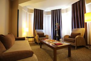 Posezení v ubytování Rumi Hotel