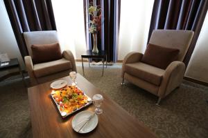 Posezení v ubytování Rumi Hotel