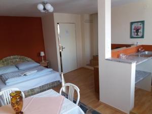Postel nebo postele na pokoji v ubytování Apartmány Sedmikráska