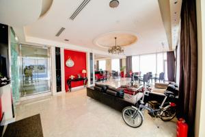 a living room with a bike parked in the middle at Comfy Boutique Hotel in Kalamata
