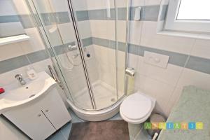 Kúpeľňa v ubytovaní Apartments Šuperba + 35 fotografií