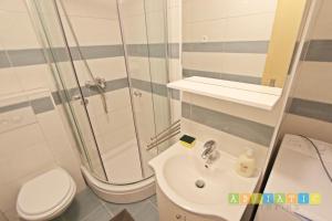 Kúpeľňa v ubytovaní Apartments Šuperba