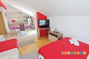 Posteľ alebo postele v izbe v ubytovaní Apartments Šuperba