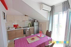 Kuchyňa alebo kuchynka v ubytovaní Apartments Šuperba