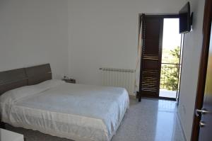 Postel nebo postele na pokoji v ubytování B&B Incantevole Vicolo