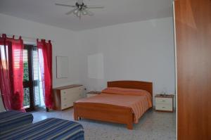 Postel nebo postele na pokoji v ubytování B&B Incantevole Vicolo