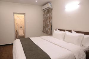 Cama o camas de una habitación en Avea Accommodation