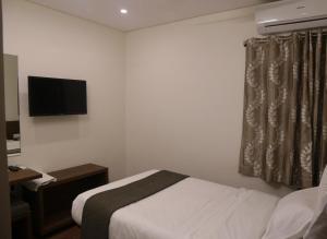 Postel nebo postele na pokoji v ubytování Avea Accommodation