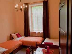 Postel nebo postele na pokoji v ubytování Hostel Lux