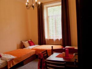 Postel nebo postele na pokoji v ubytování Hostel Lux
