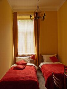 Postel nebo postele na pokoji v ubytování Hostel Lux