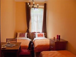 Postel nebo postele na pokoji v ubytování Hostel Lux