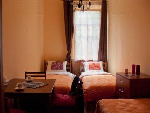 Postel nebo postele na pokoji v ubytování Hostel Lux