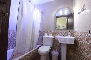 Ein Badezimmer in der Unterkunft Hostal Rocio